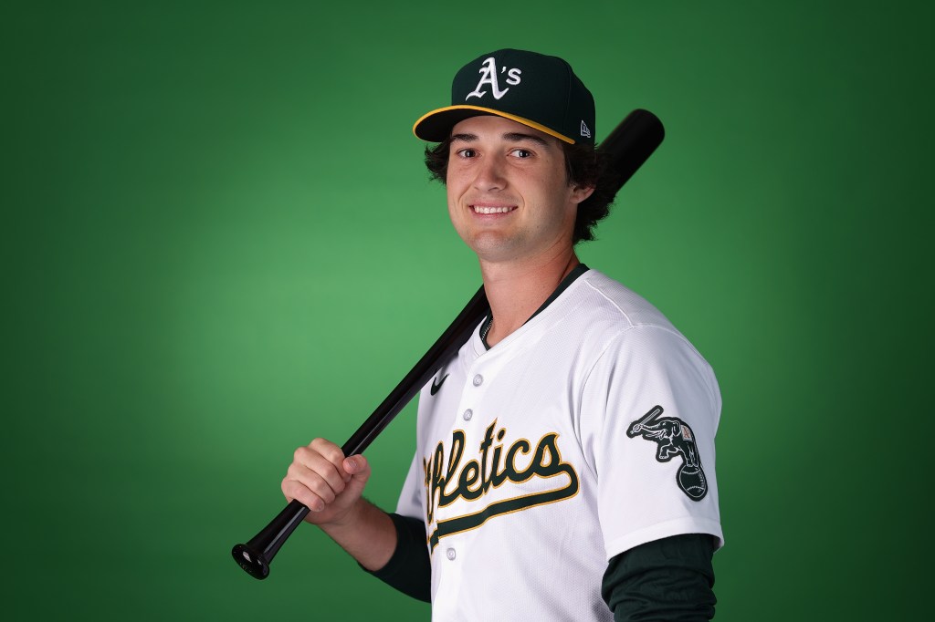 Jacob Wilson of the Oakland Athletics poses for a portrait during photo day at HoHoKam Stadium.